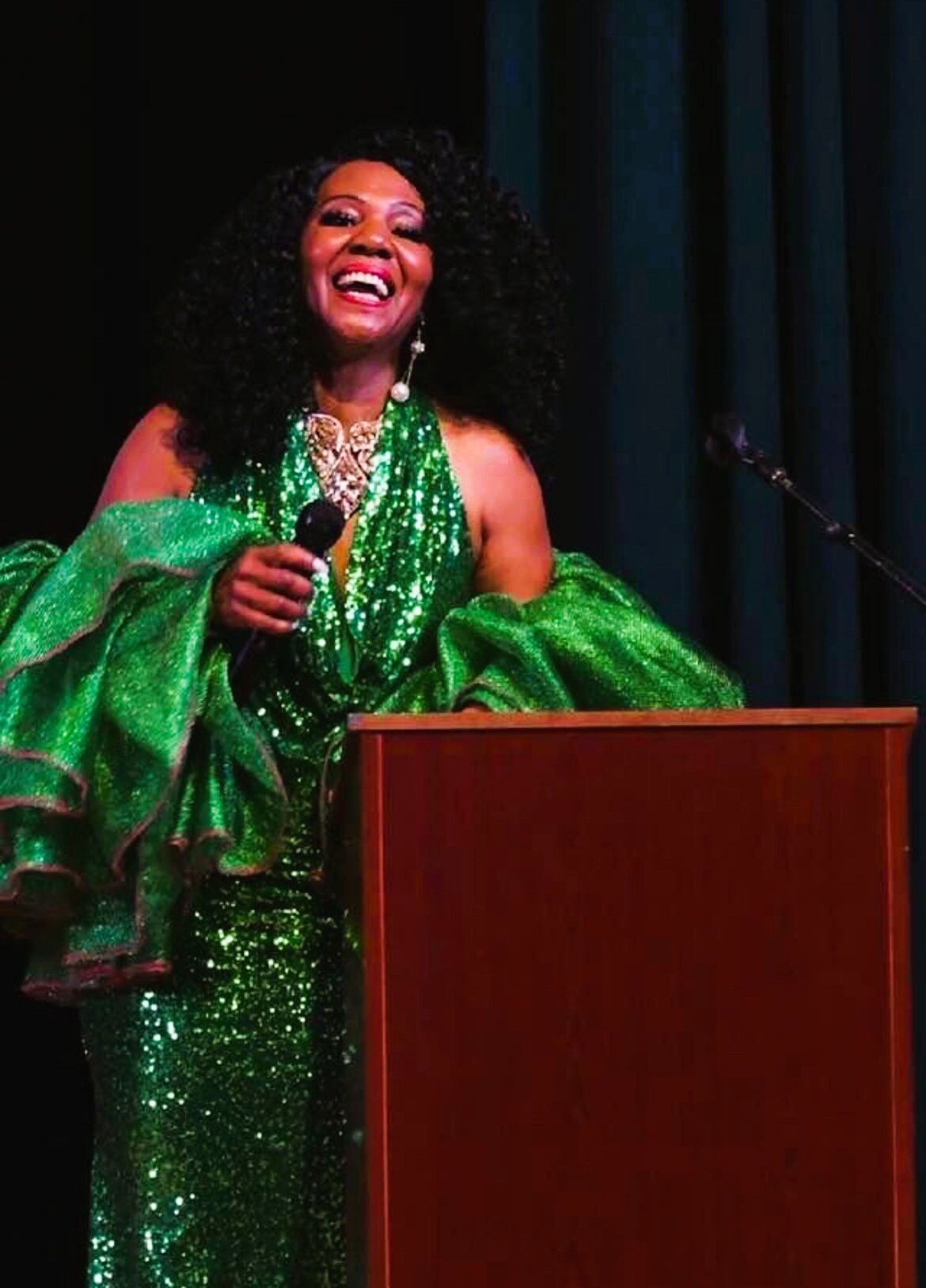 Regina Rice, singer and media personality, did interviews on the Red Carpet before the event. (Photo courtesy of The Dream Awards)